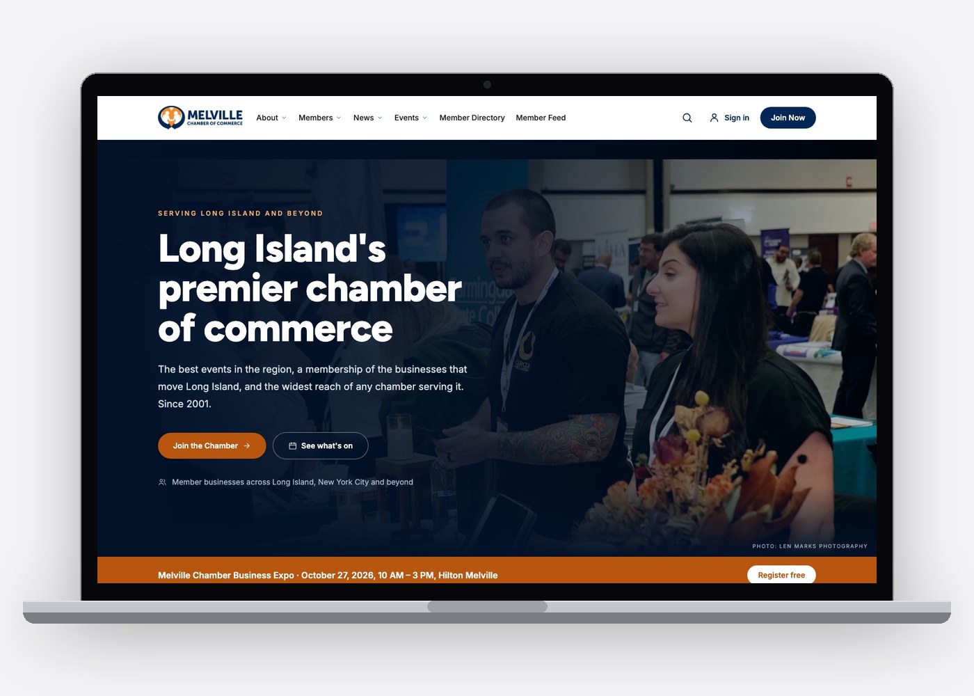The Melville Chamber of Commerce home page on a laptop, with the Business Expo banner.